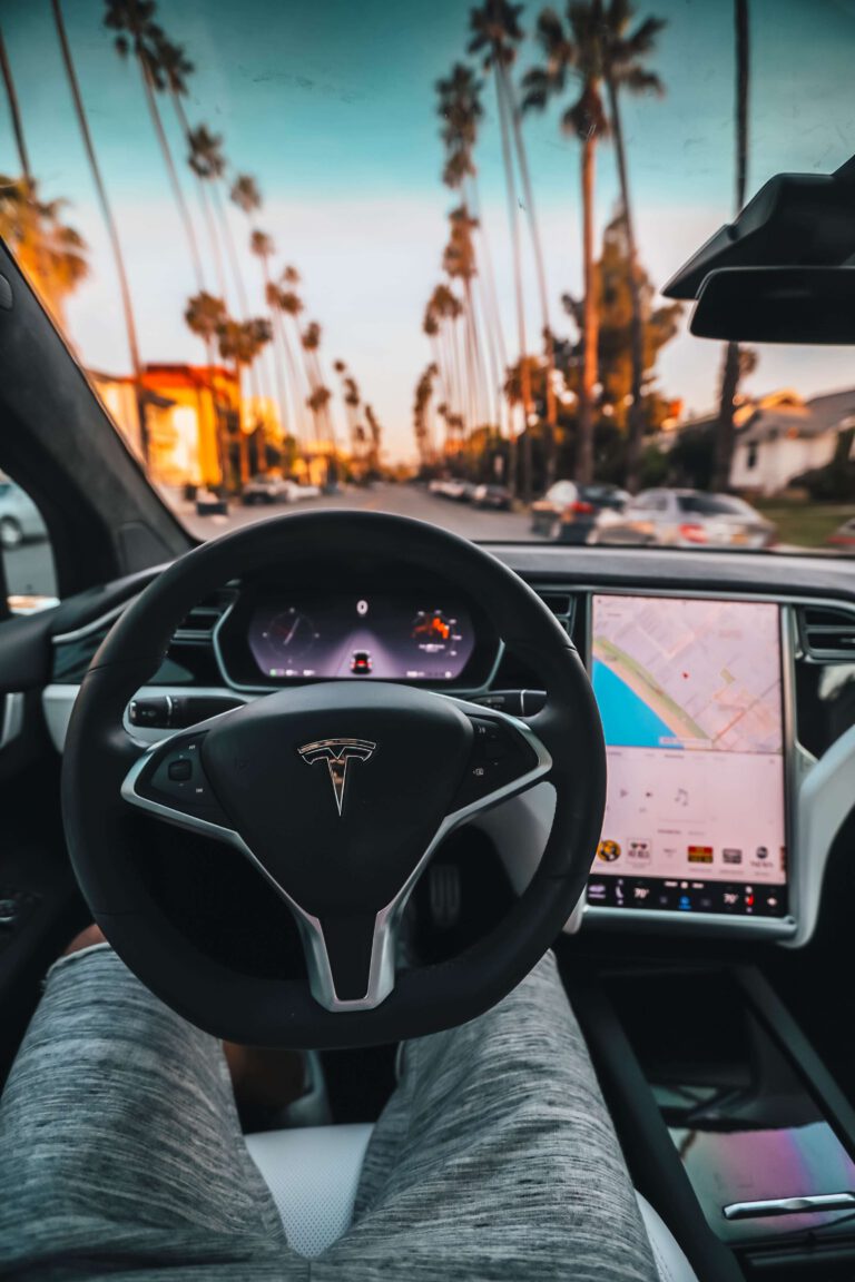 The dashboard of a Tesla Model S, featuring advanced technology and sleek design.