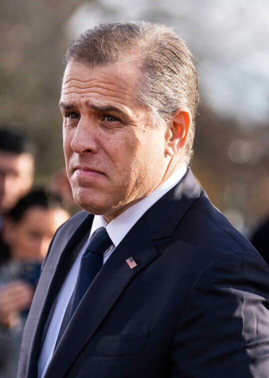 Attorney and businessman Hunter Biden (son of US President Joseph Biden) on the left, surrounded by a gaggle of reporters asking about Biden's potential testimony before the House of Representatives about his foreign business dealings